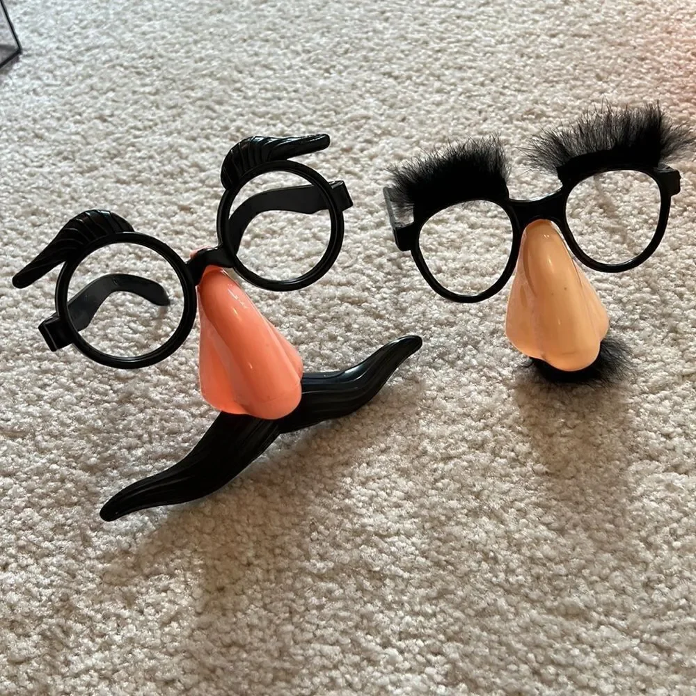 Halloween pumpkin, crazy glasses & noise makers.